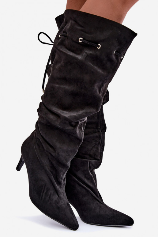 botas altas y cálidas con tacones delgados y detalles elegantes en color negro Tivelle