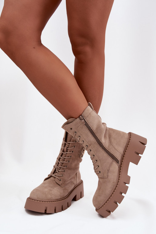 Botines aislados beiges con adornos Melisse