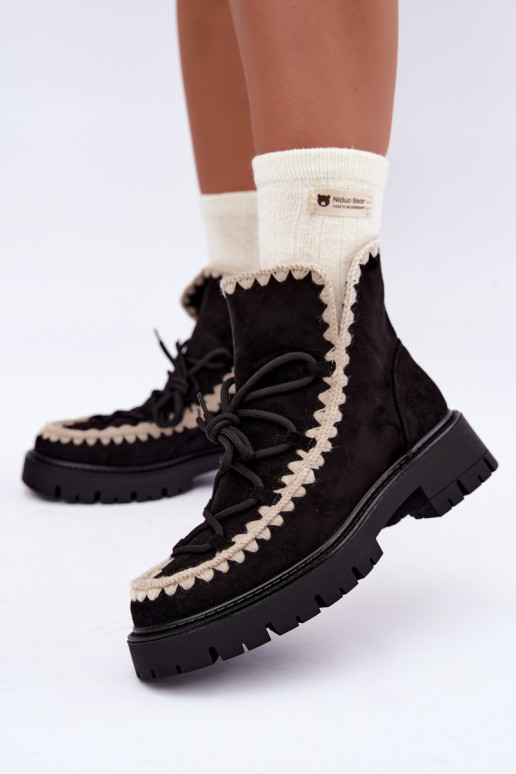 Botas de nieve con detalles elegantes en color negro Cariselle