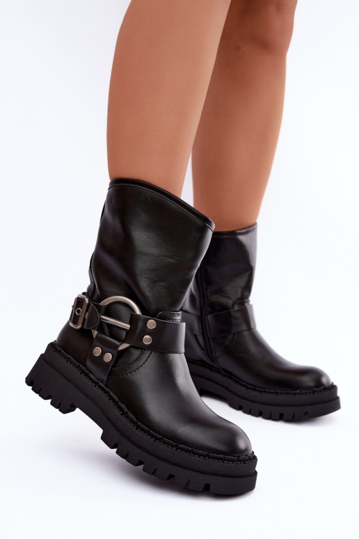 botines aislados con plataforma y correas en color negro Arienna