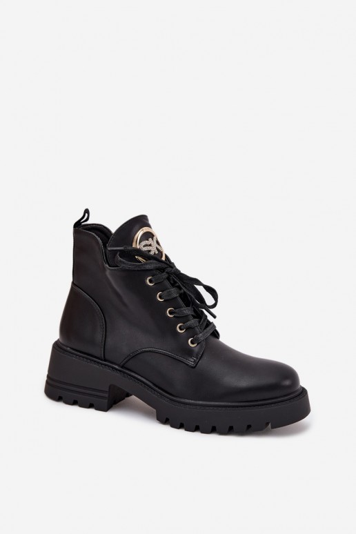 Botines aislados para mujer con detalles dorados en negro Kavirae