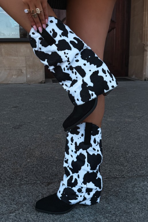 Botines de estilo cowboy con caña curva y tacones en color negro Havie