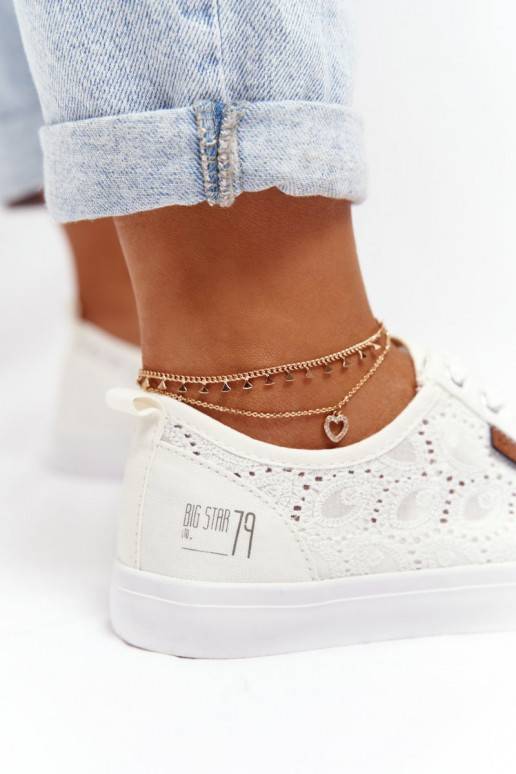 Zapatillas blancas con motivos de... Zapatillas blancas con motivos de...