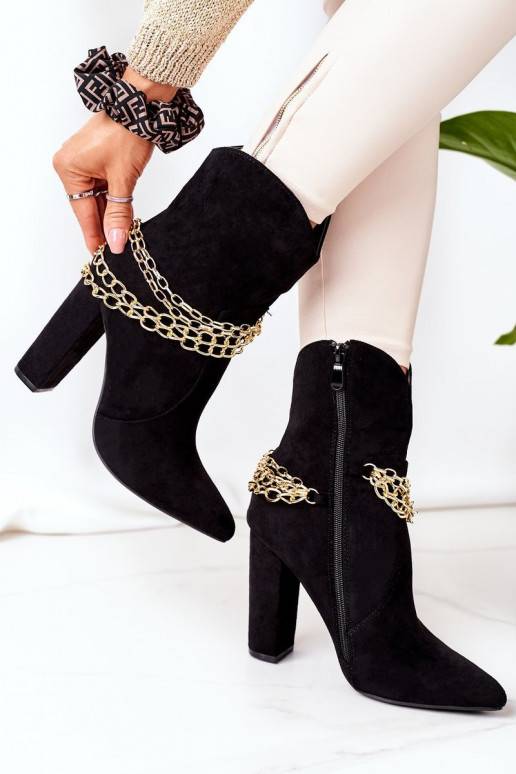 Botas calefactables con tacón en... Botas calefactables con tacón en...