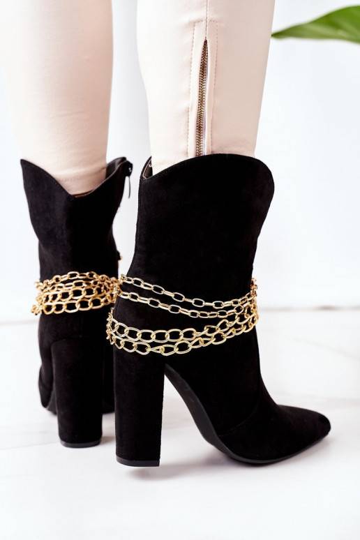 Botas calefactables con tacón en... Botas calefactables con tacón en...