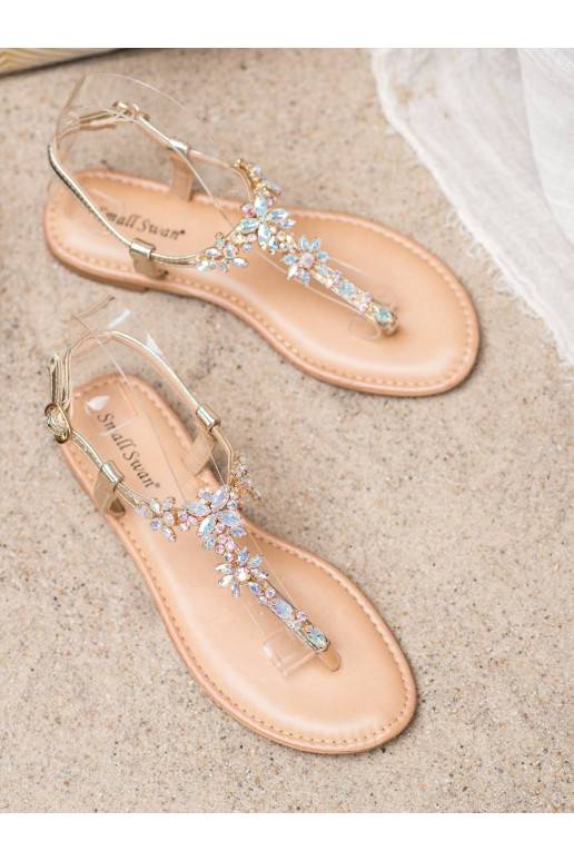 Sandalias de estilo elegante con ojales brillantes.