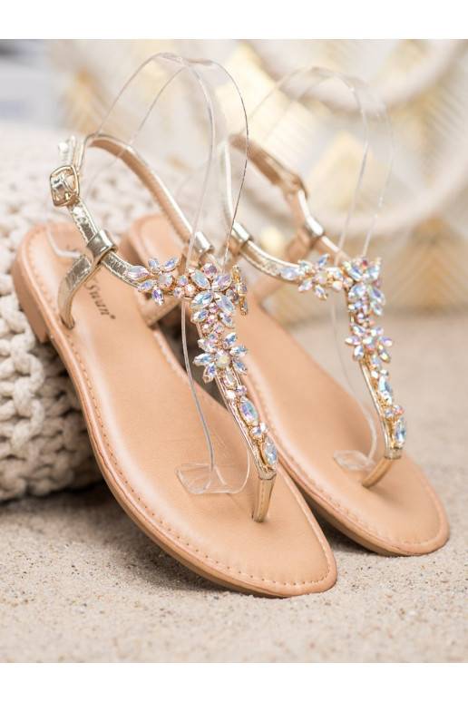 Sandalias de estilo elegante con ojales brillantes.