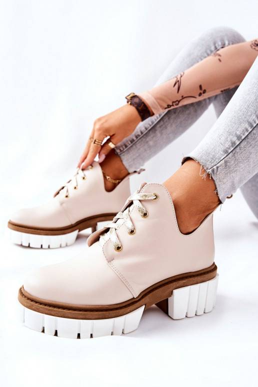 Botas Cut Out con tiras beige Kaxo