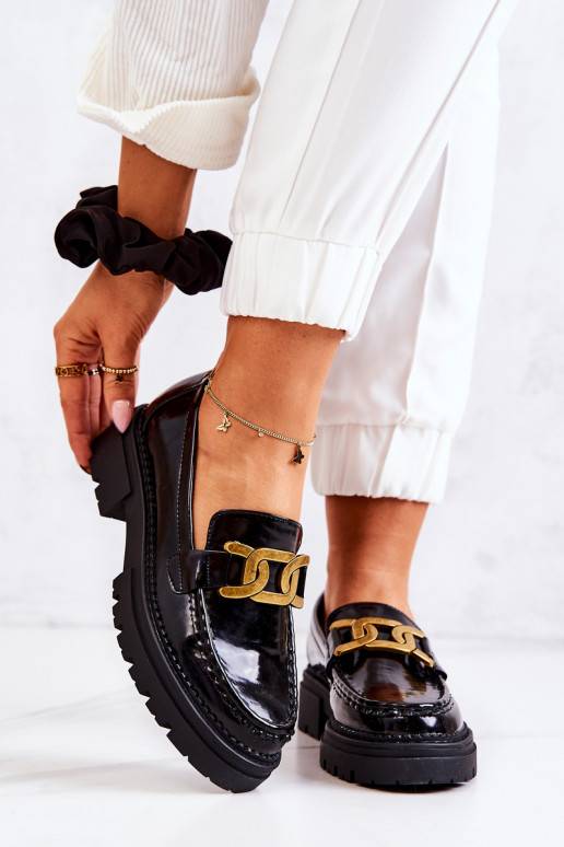 Zapatos con efecto charol y adornos...