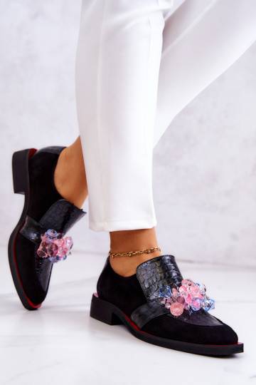 Botas de ante con adornos...