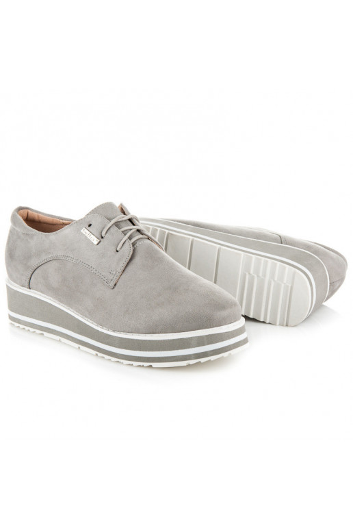 Zapatos de ocio grises.