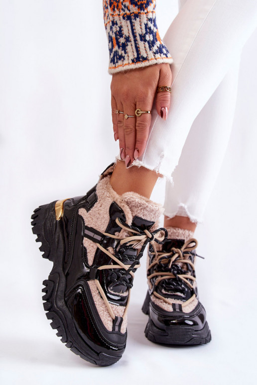 Calzado deportivo calentado negro y... Calzado deportivo calentado negro y...