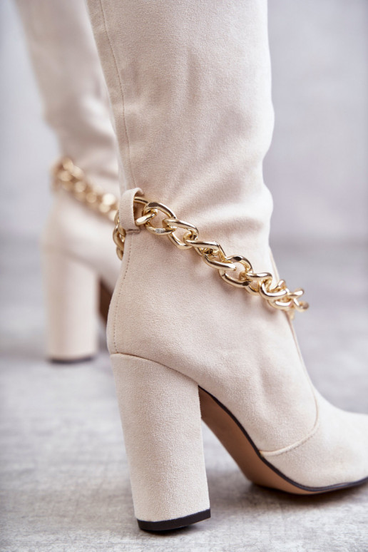 Botines calefactables con cadenas marfil Jasmin