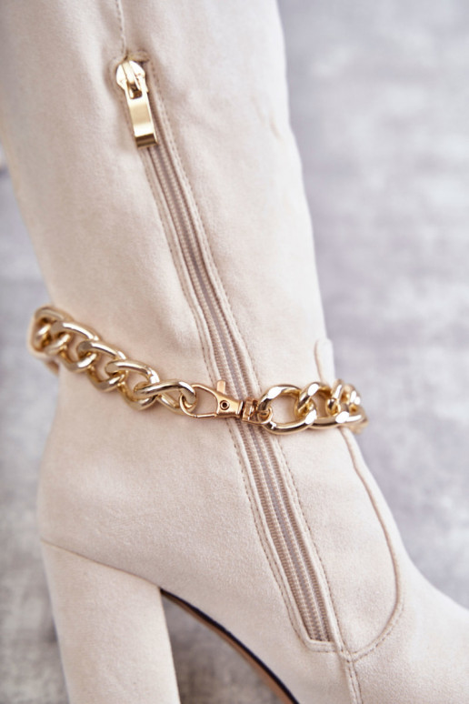 Botines calefactables con cadenas marfil Jasmin