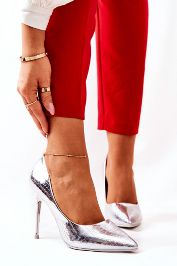 Tacones altos plateados con...