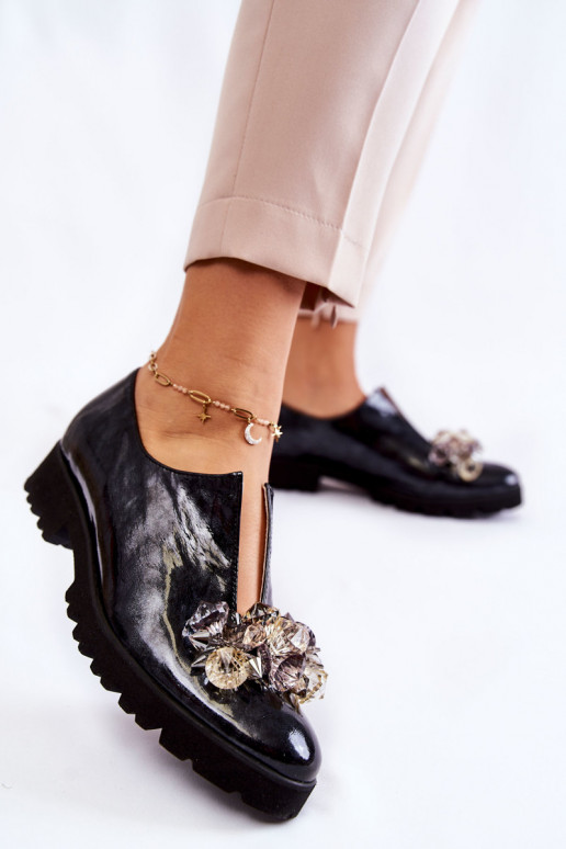 Zapatos de mujer con adornos y efecto...