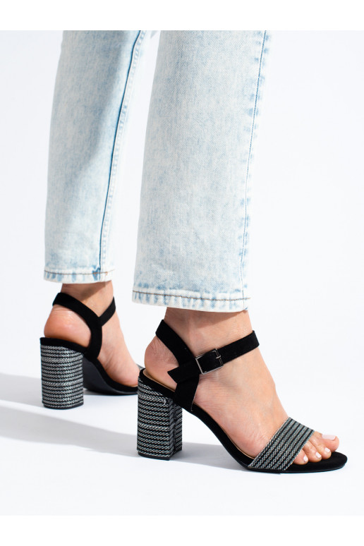 Zapatos Shelovet negros con tacones elegantes.