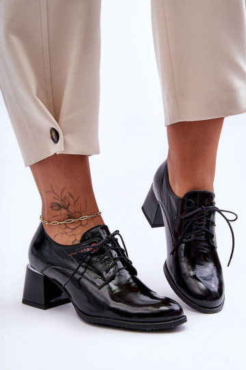 Botines lacados con tacón...