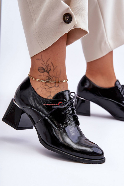 Botines lacados con tacón en color... Botines lacados con tacón en color...