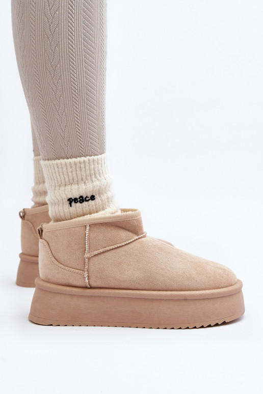 Botas de nieve con suela maciza beige... Botas de nieve con suela maciza beige...