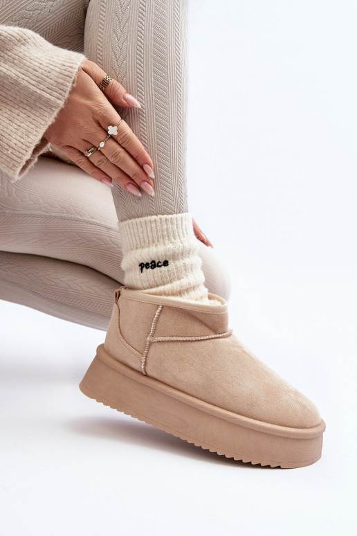 Botas de nieve con suela maciza beige... Botas de nieve con suela maciza beige...