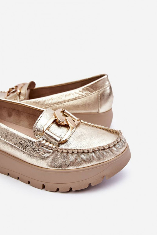 Mocasines de plataforma con adornos dorados de Lemar Desmond