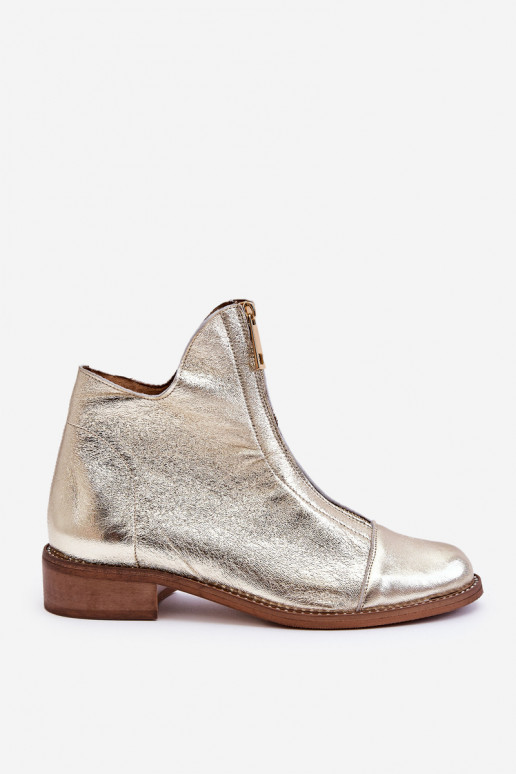Botas con cremalleras en color dorado...