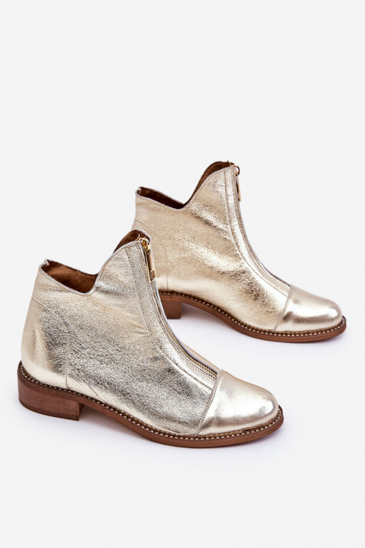 Botas con cremalleras en color dorado...
