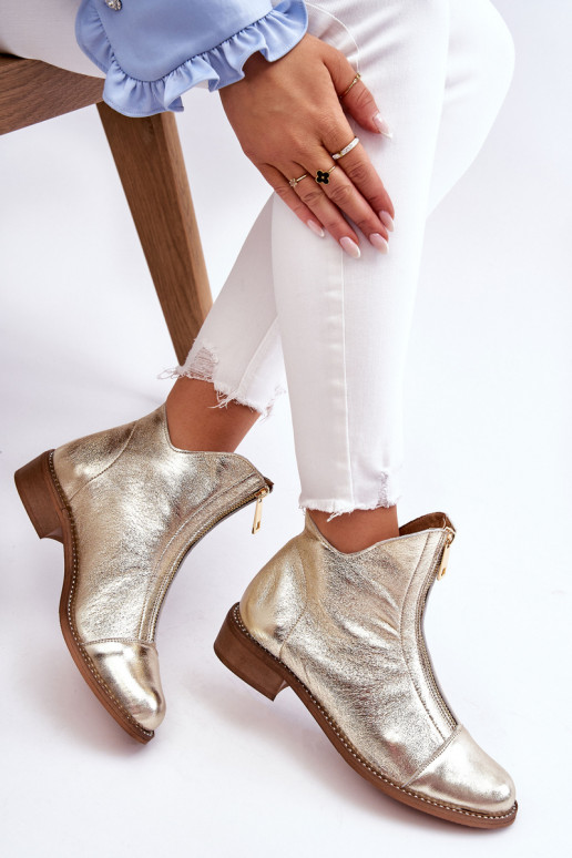 Botas con cremalleras en color dorado Zazoo