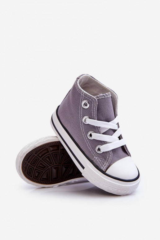 Zapatos infantiles con suela gris...