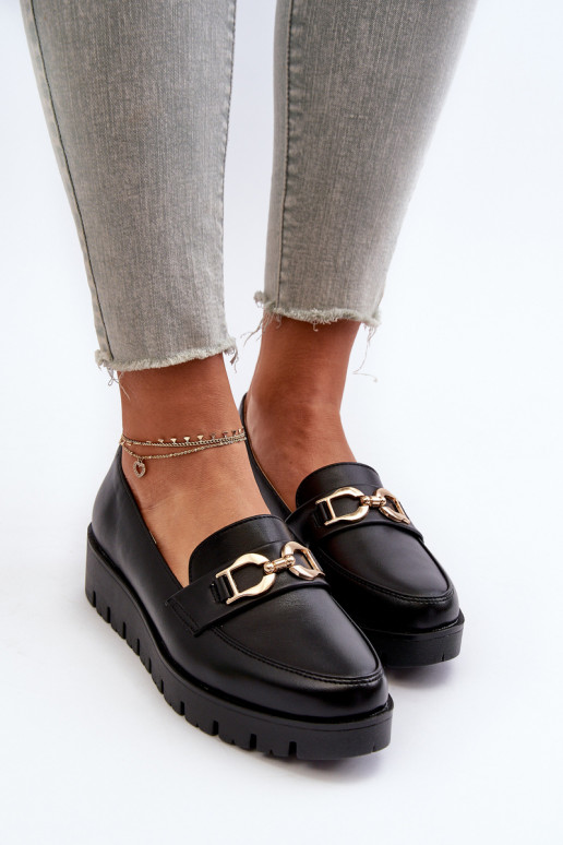 Mocasines de mujer con suela dorada con adornos en color negro Kaldina