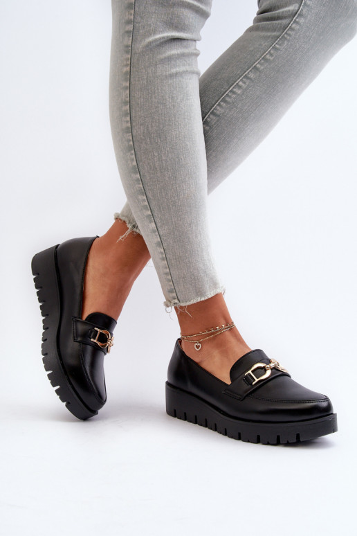 Mocasines de mujer con suela dorada con adornos en color negro Kaldina