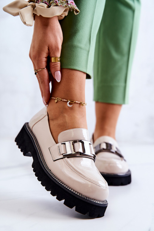 Zapatos con efecto charol en marfil...