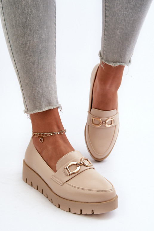 Mocasines de mujer con suela dorada...