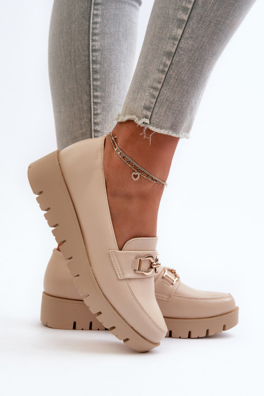 Mocasines de mujer con suela dorada...