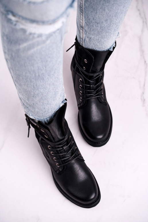 Botas masivas de moda en color negro Perfecto.