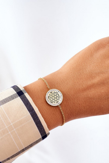 Pulsera con ojos brillantes en color dorado.