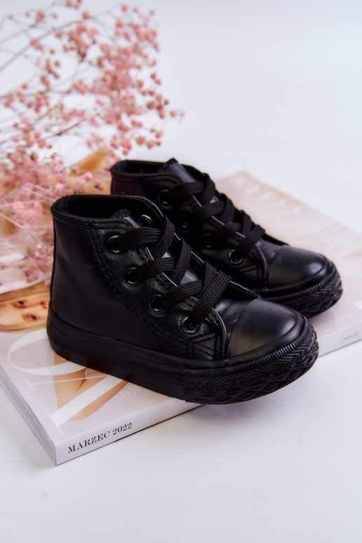 Zapatos de ocio para niños con suela Marney negra.