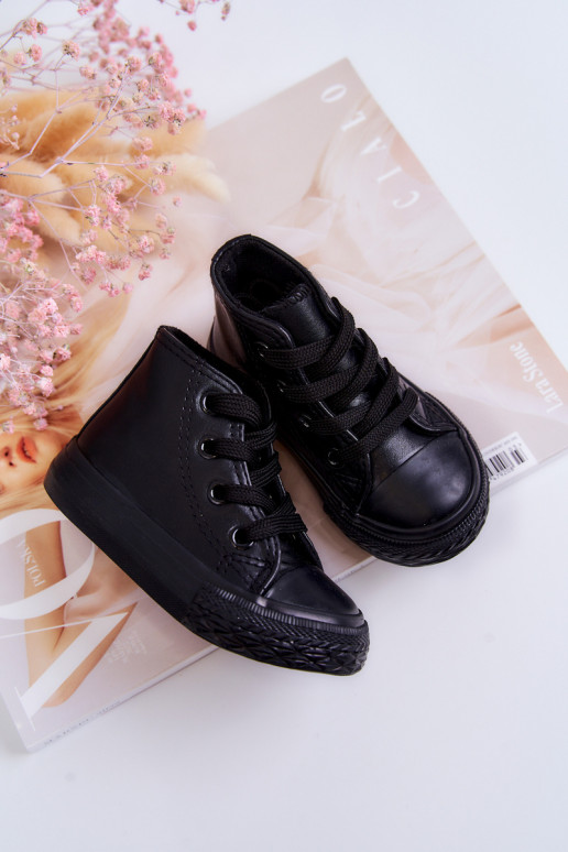 Zapatos de ocio para niños con suela Marney negra.