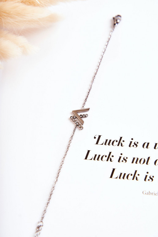 Pulsera con cadena con ojos brillantes, color plateado.