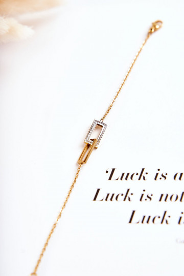 Pulsera de mujer con ojos brillantes en color dorado.