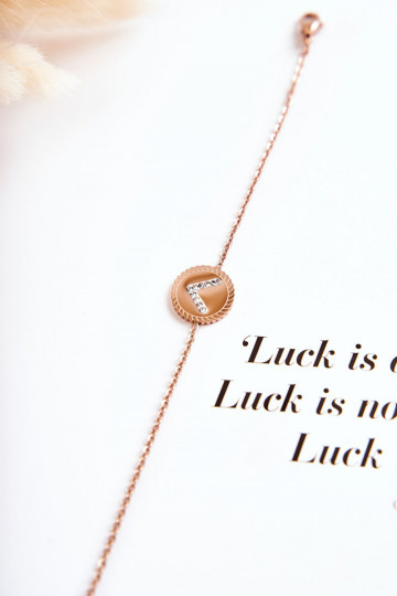 Pulsera de mujer con adornos y ojos de circonitas en oro rosa