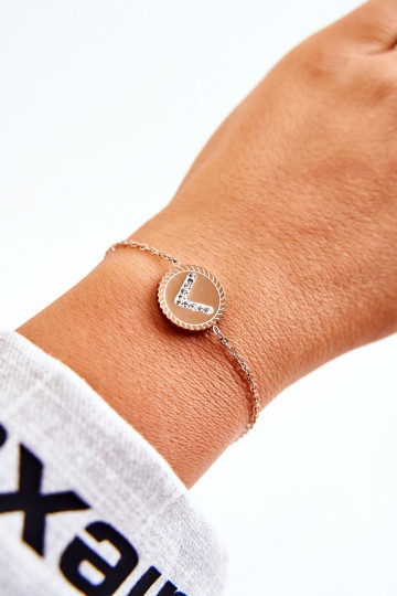 Pulsera de mujer con adornos y ojos de circonitas en oro rosa 2