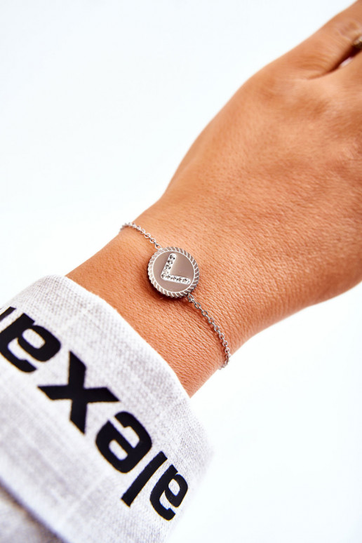 Pulsera de mujer con adornos y ojos de circonitas, color plata.