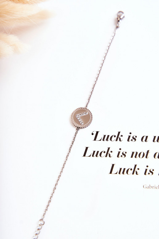 Pulsera de mujer con adornos y ojos de circonitas, color plata.