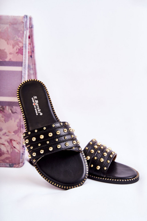 Babuchas de piel con adornos en color negro Brien