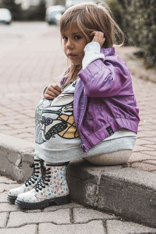 Botas infantiles con purpurina y estampados Reggie en varios colores.