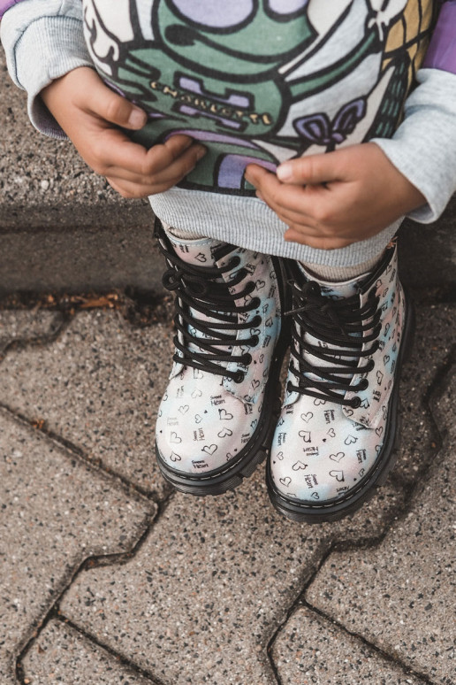 Botas infantiles con purpurina y estampados Reggie en varios colores. Botas infantiles con purpurina y estampados Reggie en varios colores.