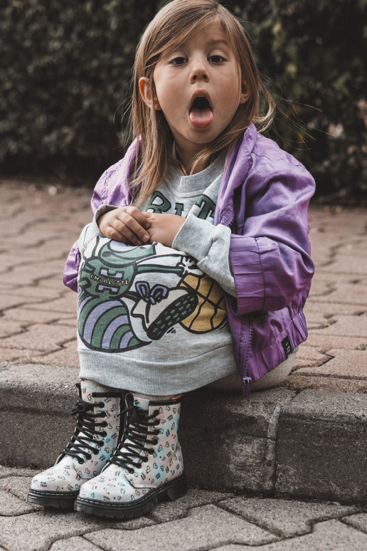 Botas infantiles con purpurina y estampados Reggie en varios colores. Botas infantiles con purpurina y estampados Reggie en varios colores.