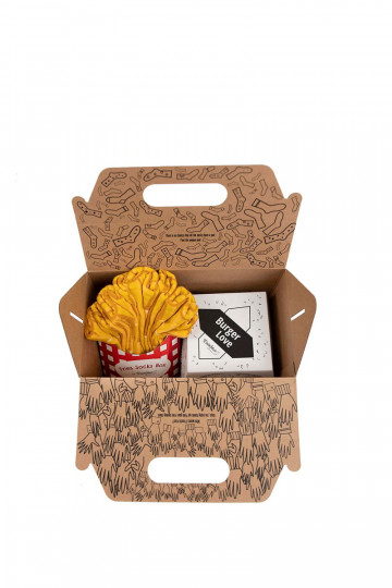 4 pares de calcetines de colores en una caja.